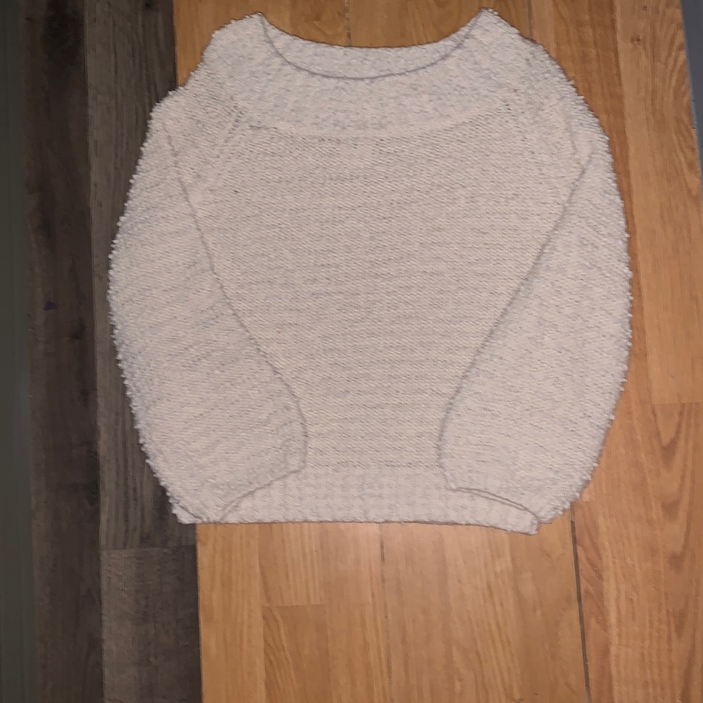 A puffy sweater worn again only a few times. Cold water when washing and no dry.